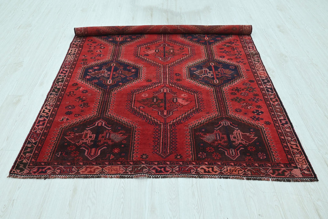 red Medium rug 4' 10" x 7' 5"