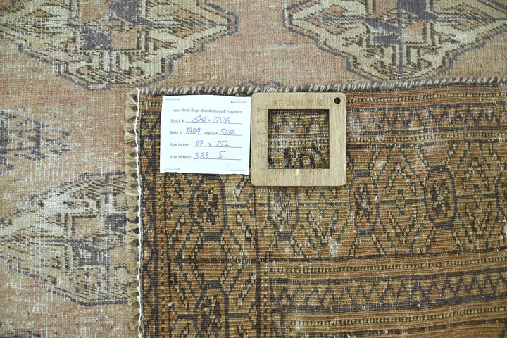 brown Accent rug 3' 10" x 5' 0"