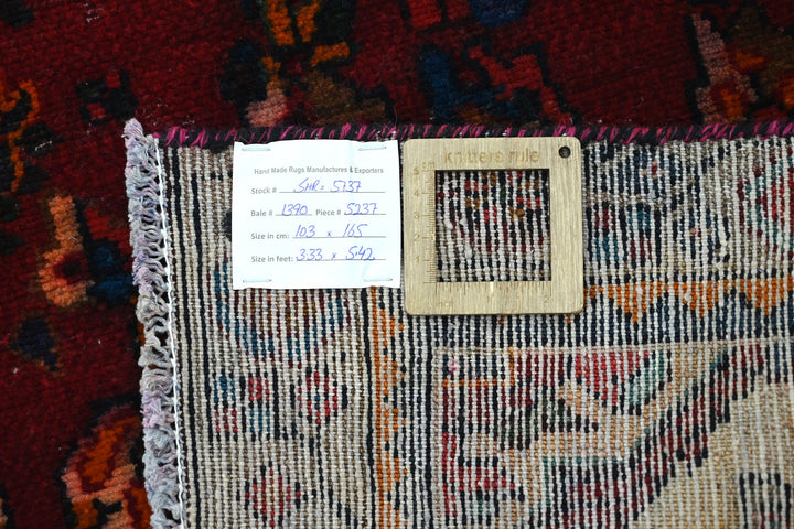 red Accent rug 3' 5" x 5' 5"