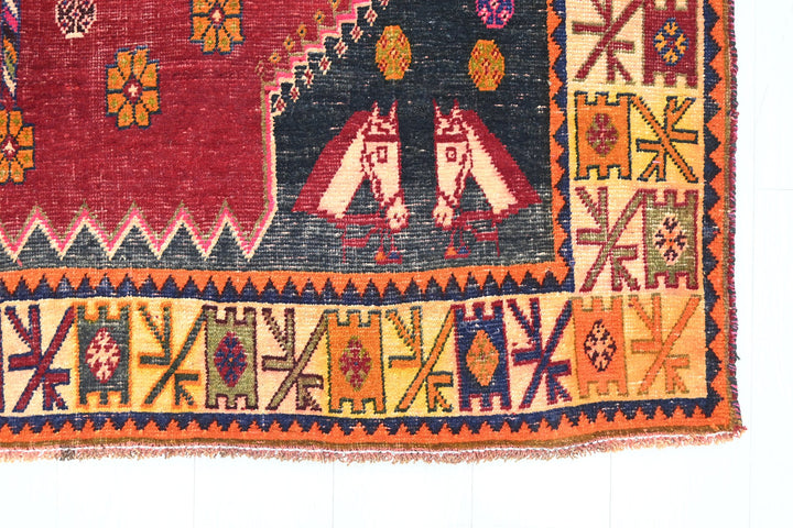 red Medium rug 5' 6" x 7' 10"