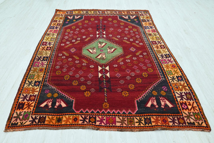 red Medium rug 5' 6" x 7' 10"