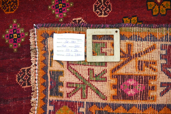 red Medium rug 5' 6" x 7' 10"