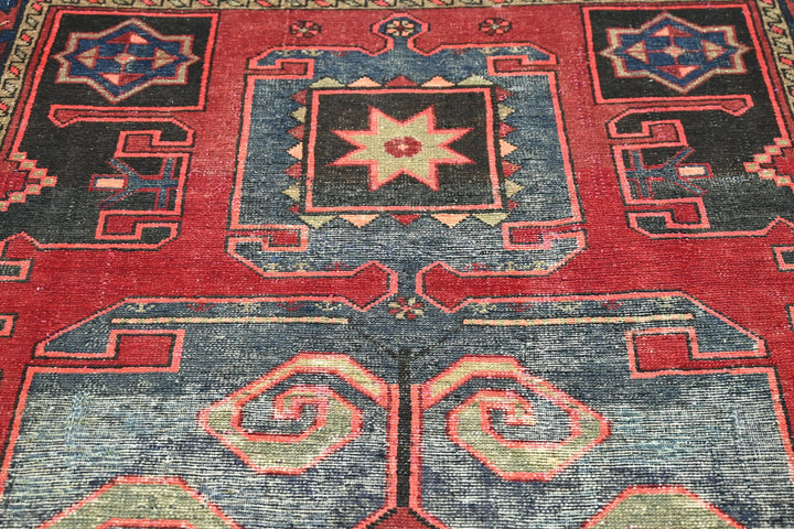 red Accent rug 4' 1" x 6' 6"