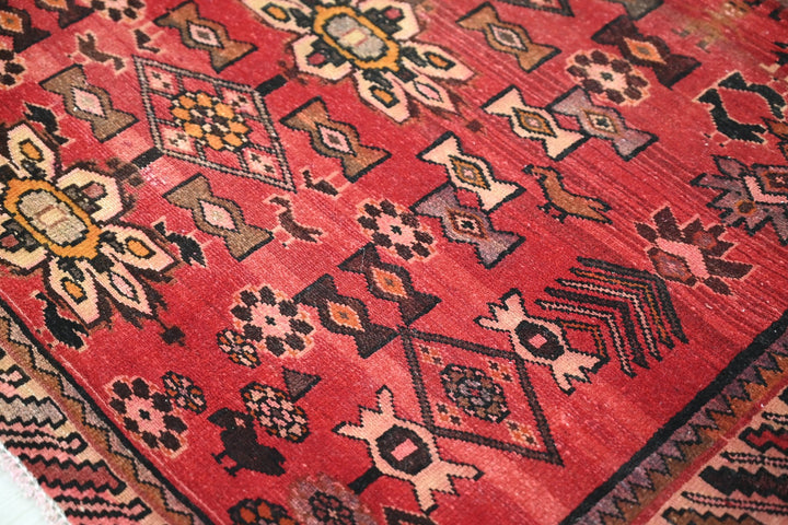 red Accent rug 3' 6" x 6' 5"