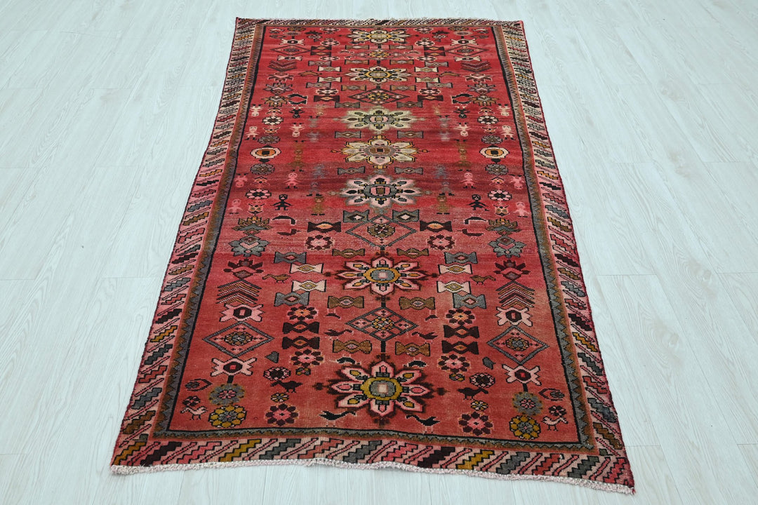 red Accent rug 3' 6" x 6' 5"