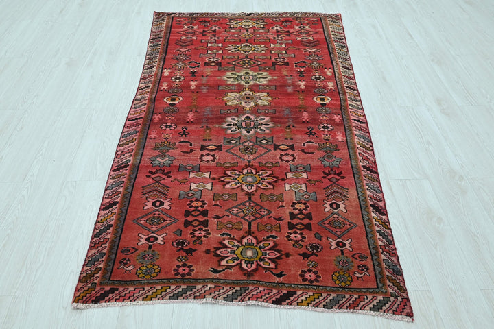 red Accent rug 3' 6" x 6' 5"
