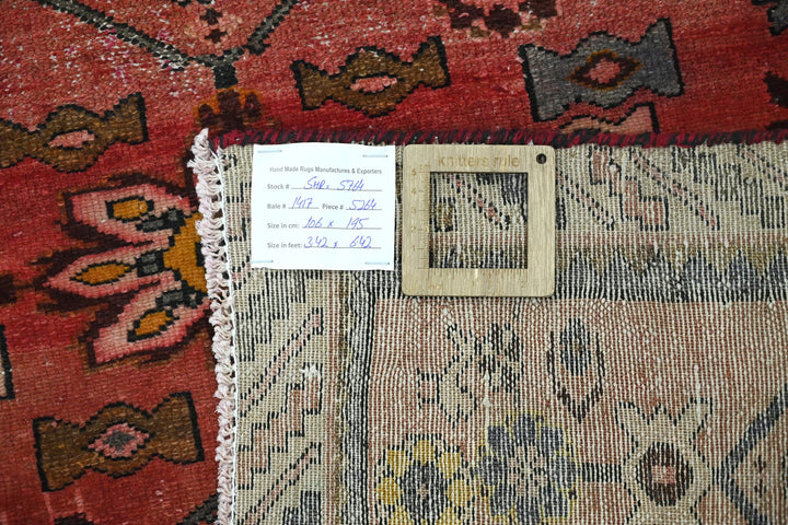 red Accent rug 3' 6" x 6' 5"