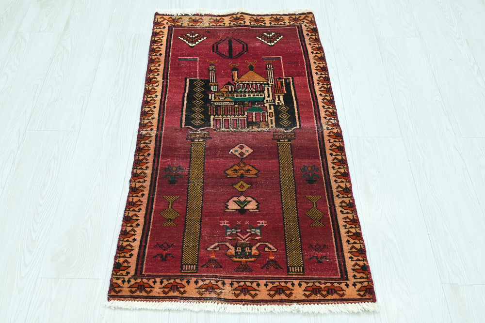 red Mini rug 1' 10" x 3' 7"