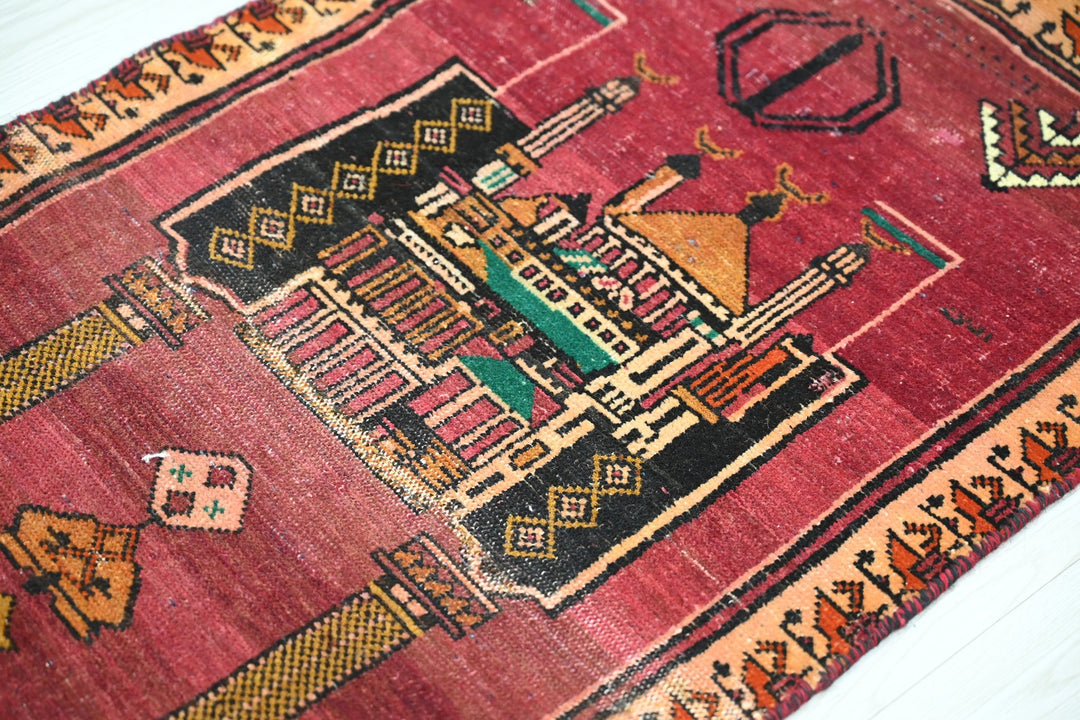 red Mini rug 1' 10" x 3' 7"