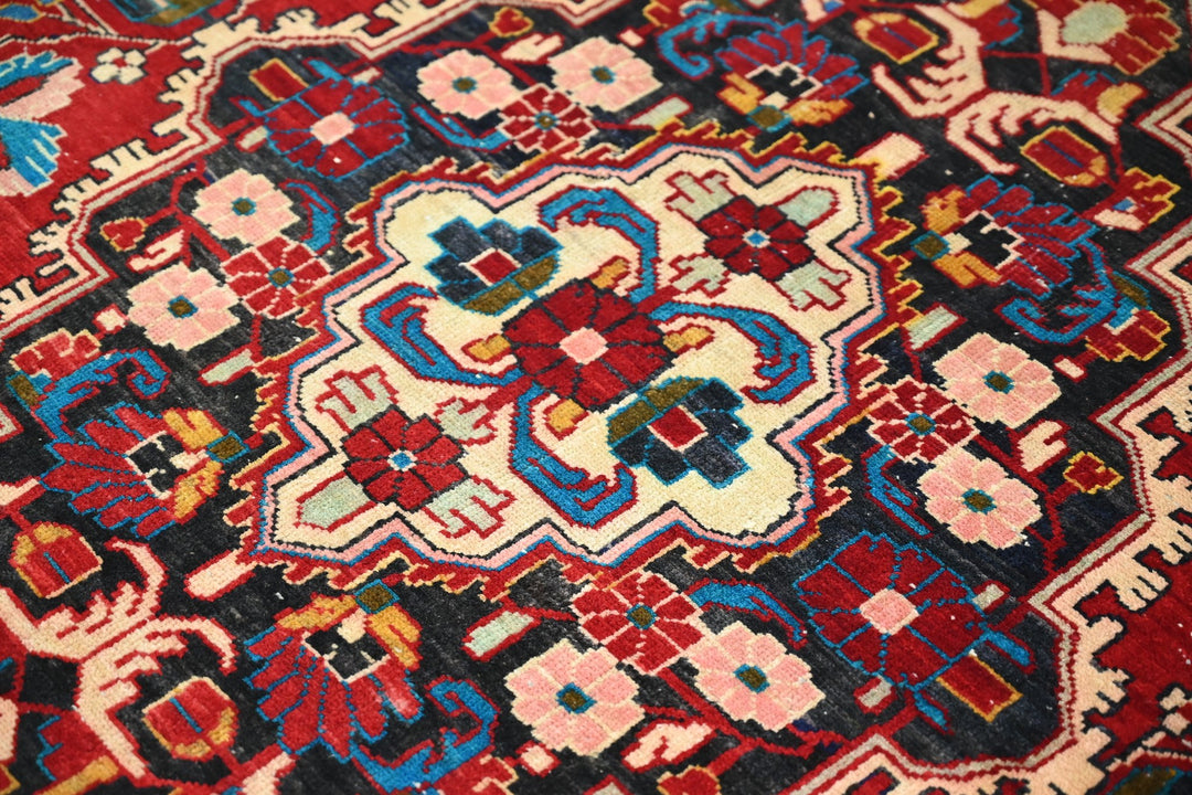 red Large rug 5' 5" x 10' 0"