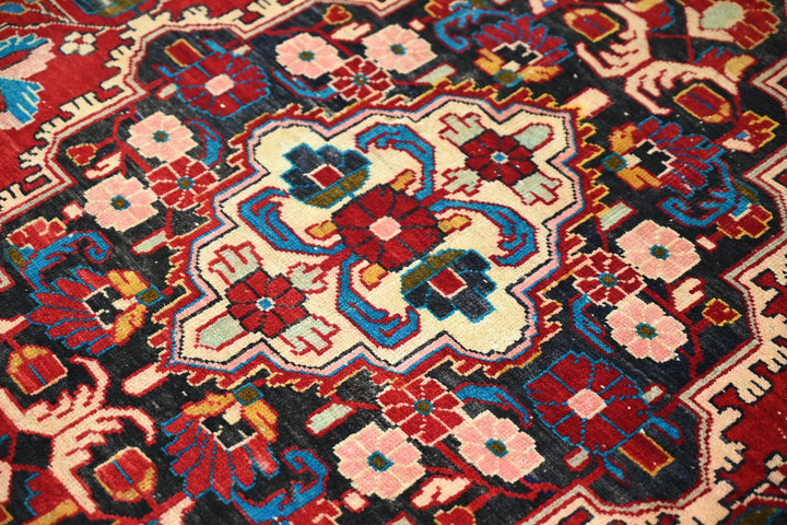 red Large rug 5' 5" x 10' 0"