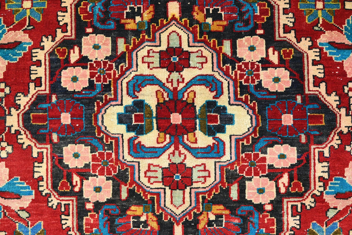 red Large rug 5' 5" x 10' 0"