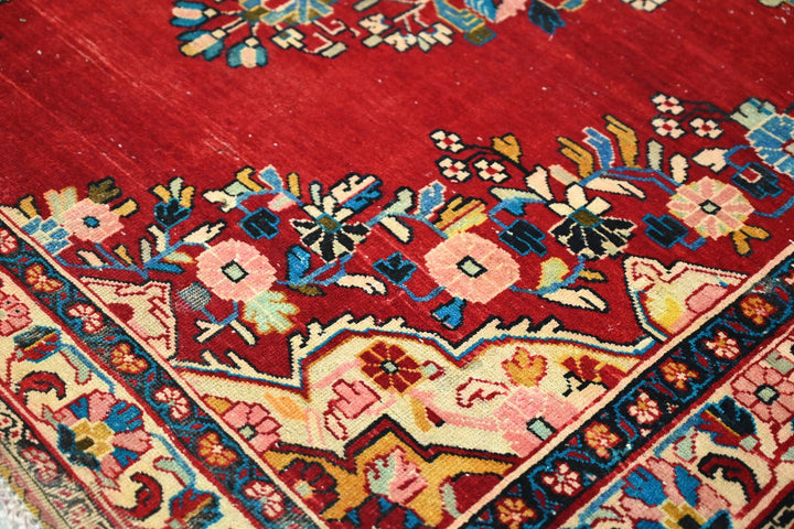 red Large rug 5' 5" x 10' 0"