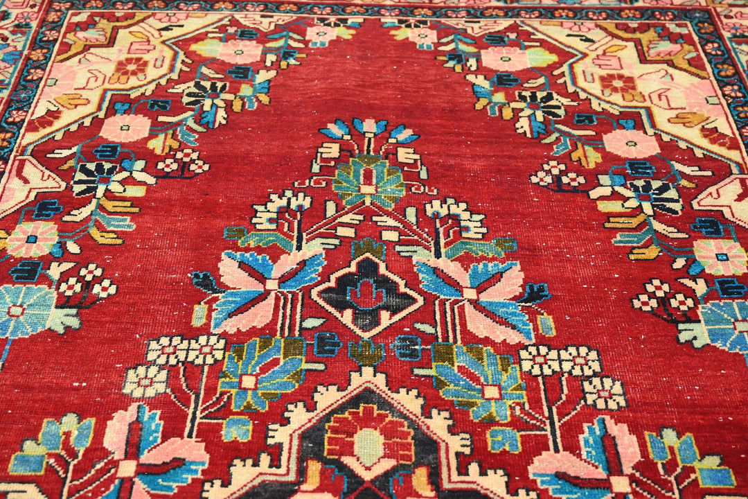 red Large rug 5' 5" x 10' 0"