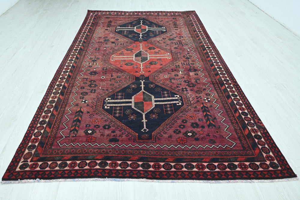 red Large rug 6' 0" x 9' 11"