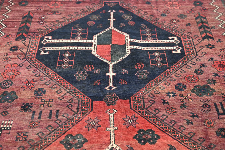 red Large rug 6' 0" x 9' 11"