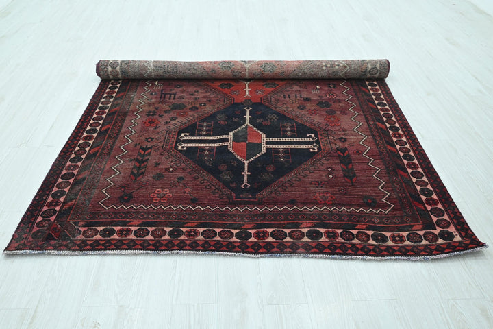 red Large rug 6' 0" x 9' 11"