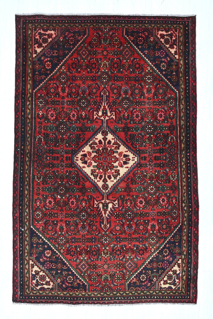 red Medium rug 4' 10" x 7' 10"