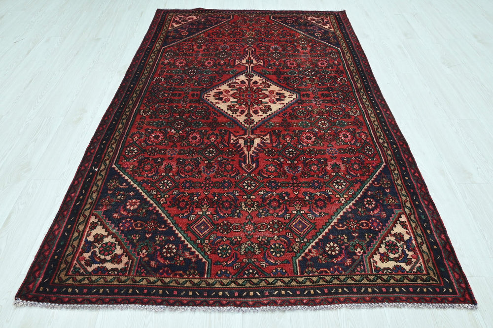 red Medium rug 4' 10" x 7' 10"