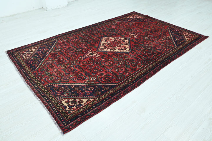 red Medium rug 4' 10" x 7' 10"