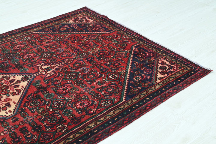 red Medium rug 4' 10" x 7' 10"