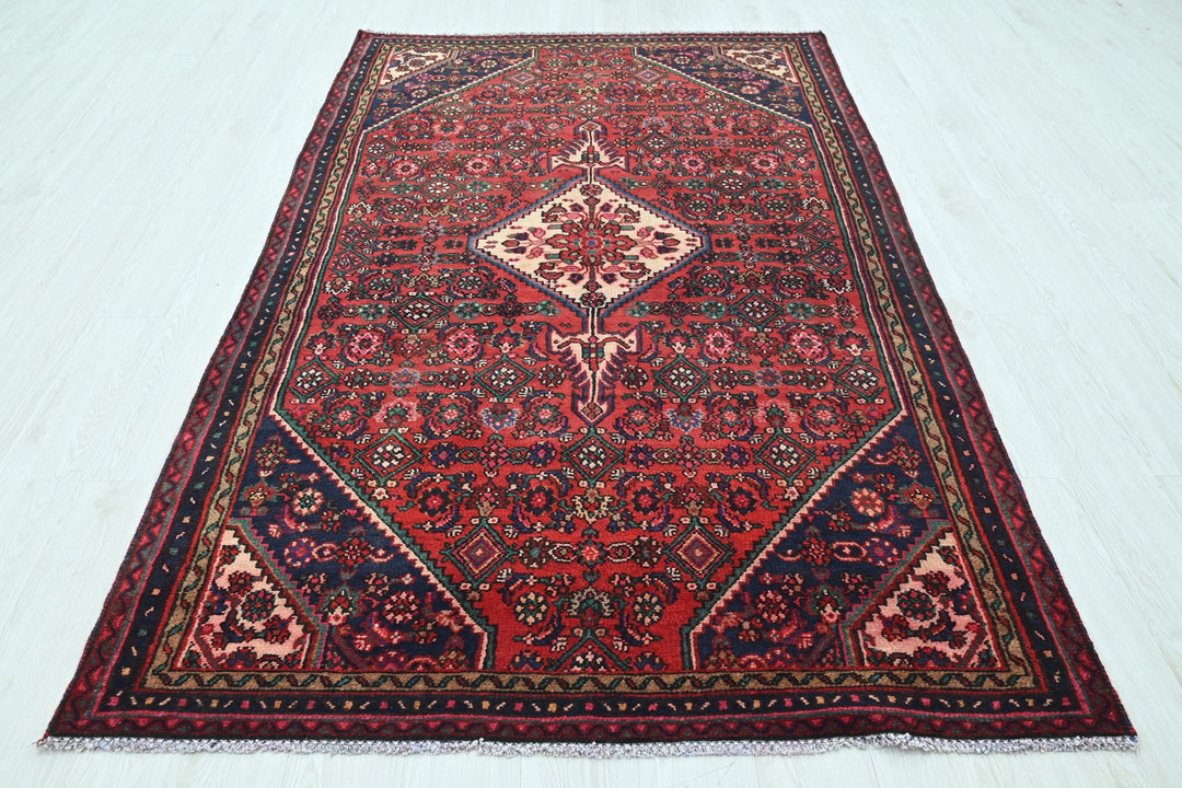 red Medium rug 4' 10" x 7' 10"