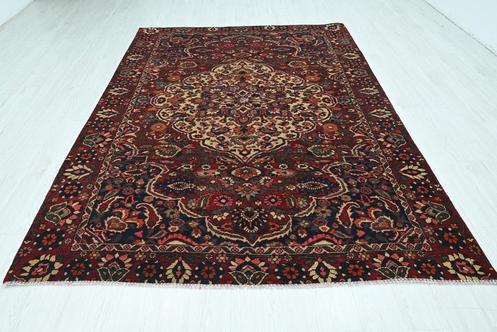 red Medium rug 6' 4" x 9' 1"