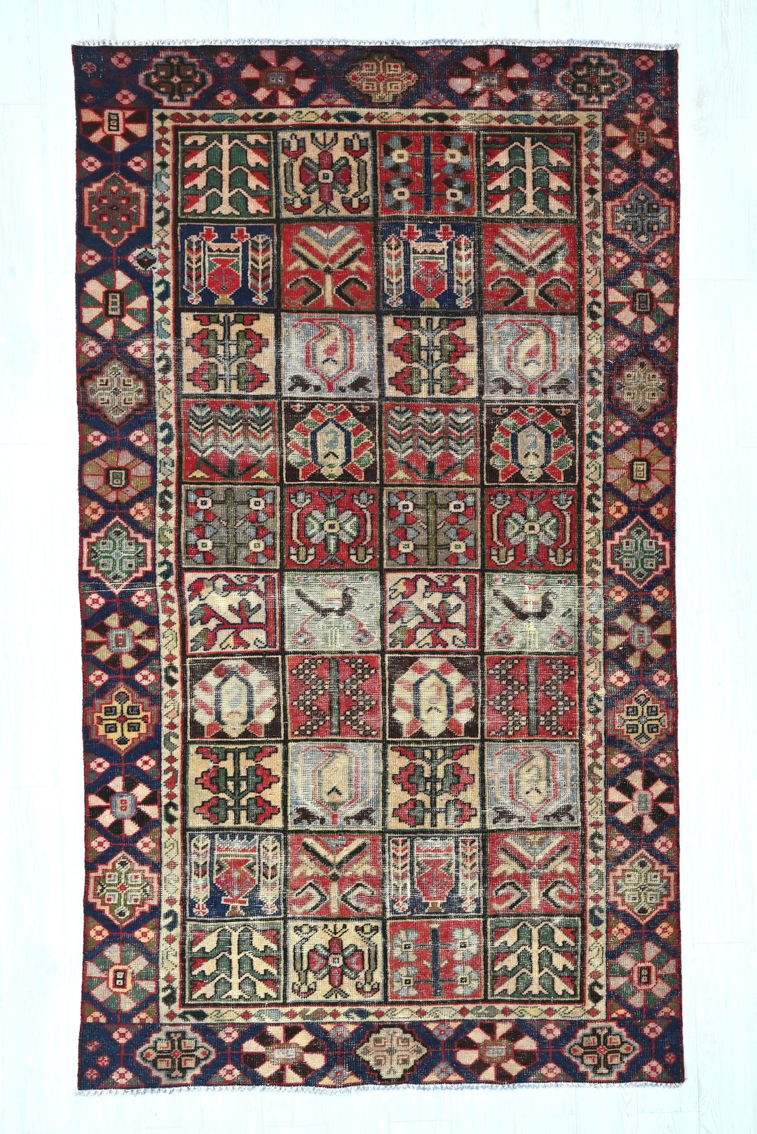 red Medium rug 4' 8" x 9' 2"