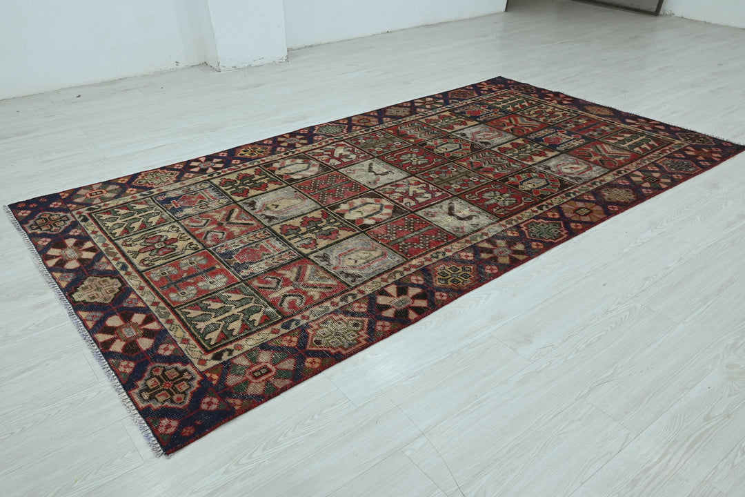 red Medium rug 4' 8" x 9' 2"
