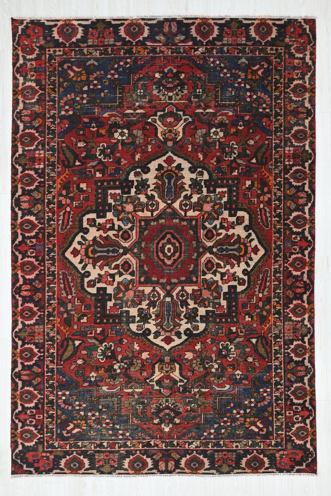 red Medium rug 6' 2" x 9' 4"