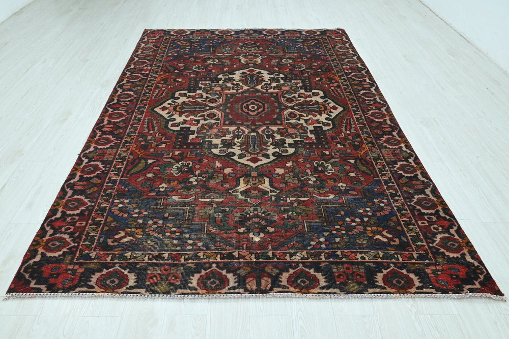 red Medium rug 6' 2" x 9' 4"