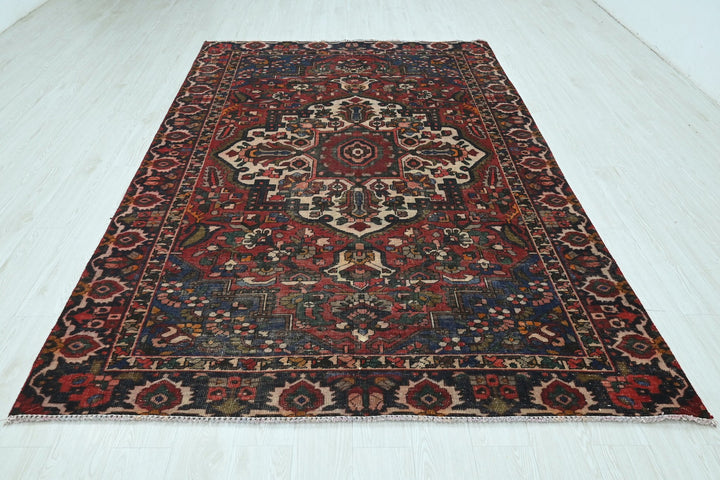 red Medium rug 6' 2" x 9' 4"