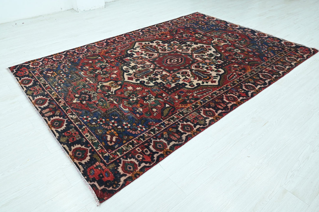 red Medium rug 6' 2" x 9' 4"