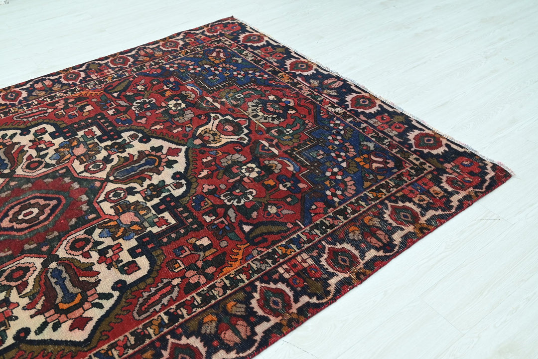 red Medium rug 6' 2" x 9' 4"