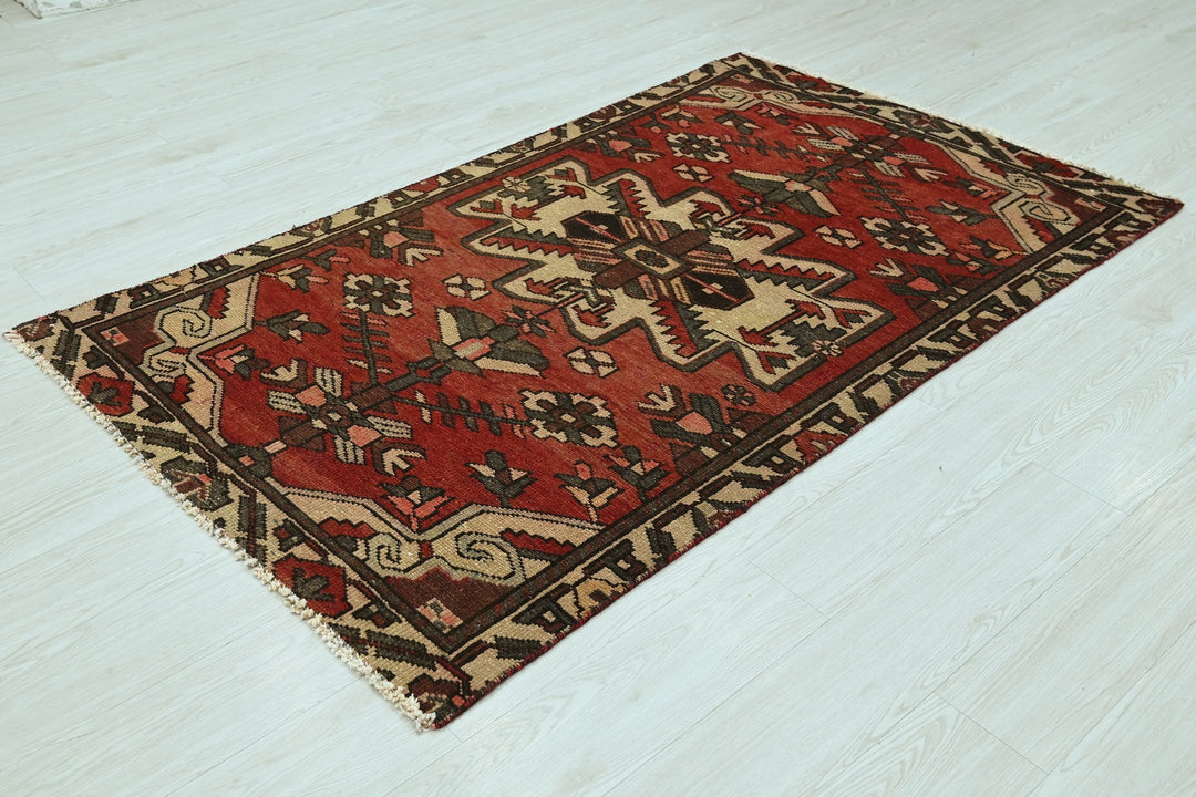 red Accent rug 3' 7" x 6' 2"