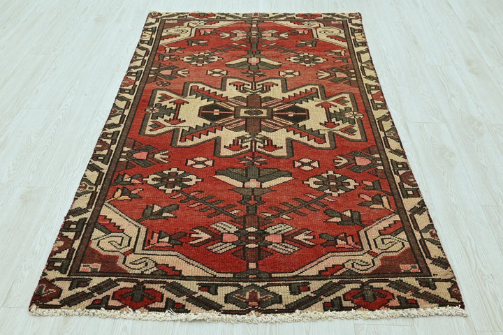 red Accent rug 3' 7" x 6' 2"