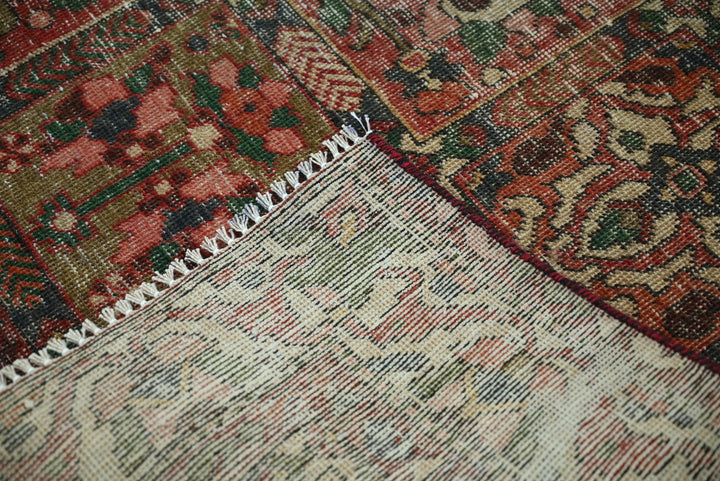 red Large rug 5' 0" x 9' 8"
