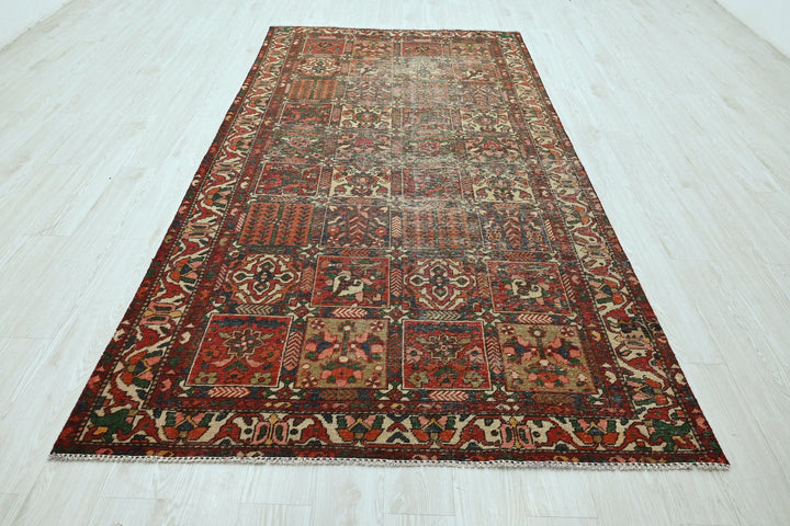 red Large rug 5' 0" x 9' 8"