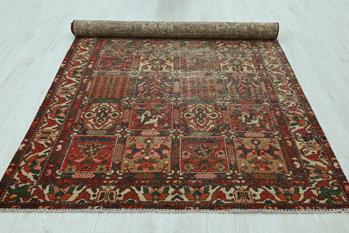 red Large rug 5' 0" x 9' 8"