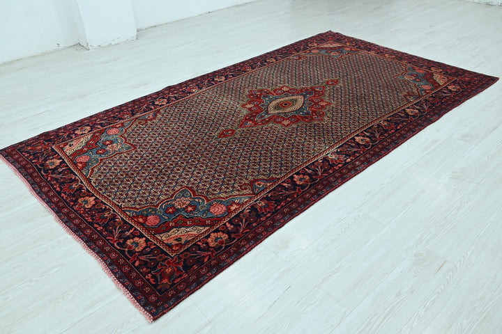 brown Large rug 5' 2" x 9' 9"