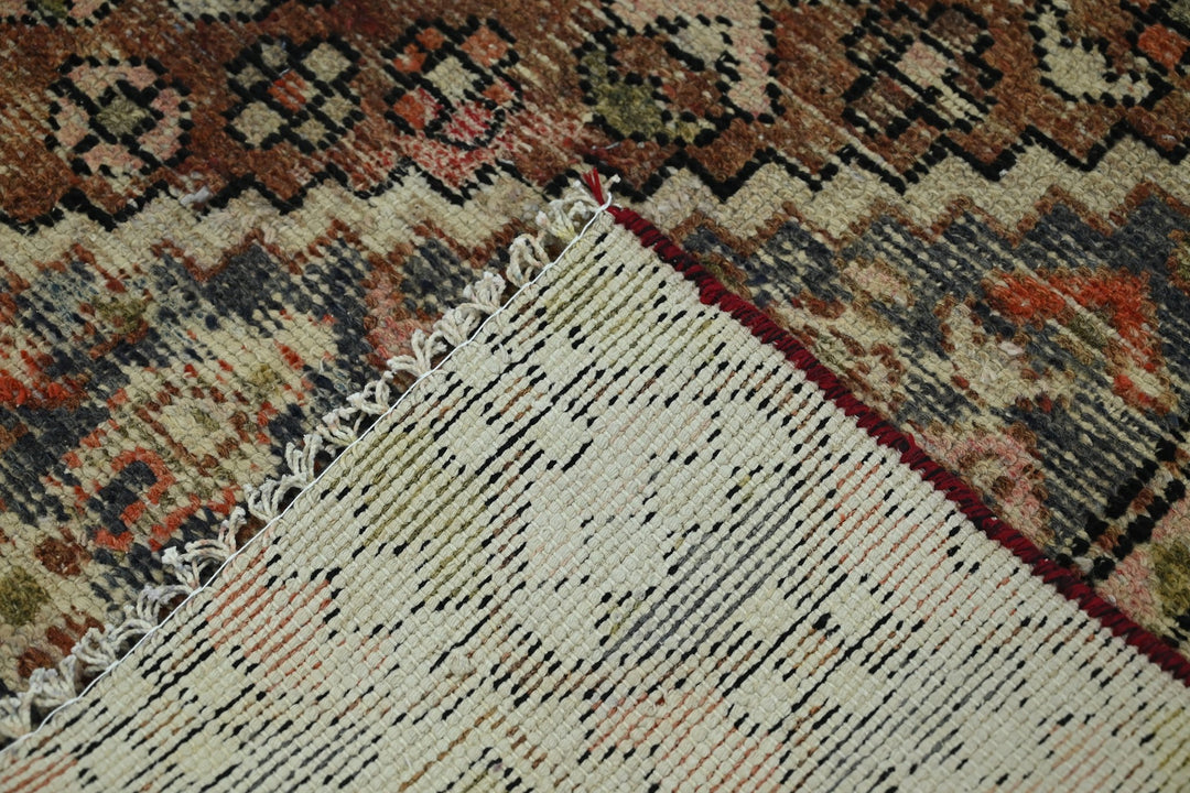 brown Medium rug 6' 0" x 8' 0"