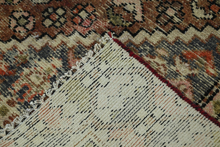 brown Medium rug 6' 0" x 8' 0"