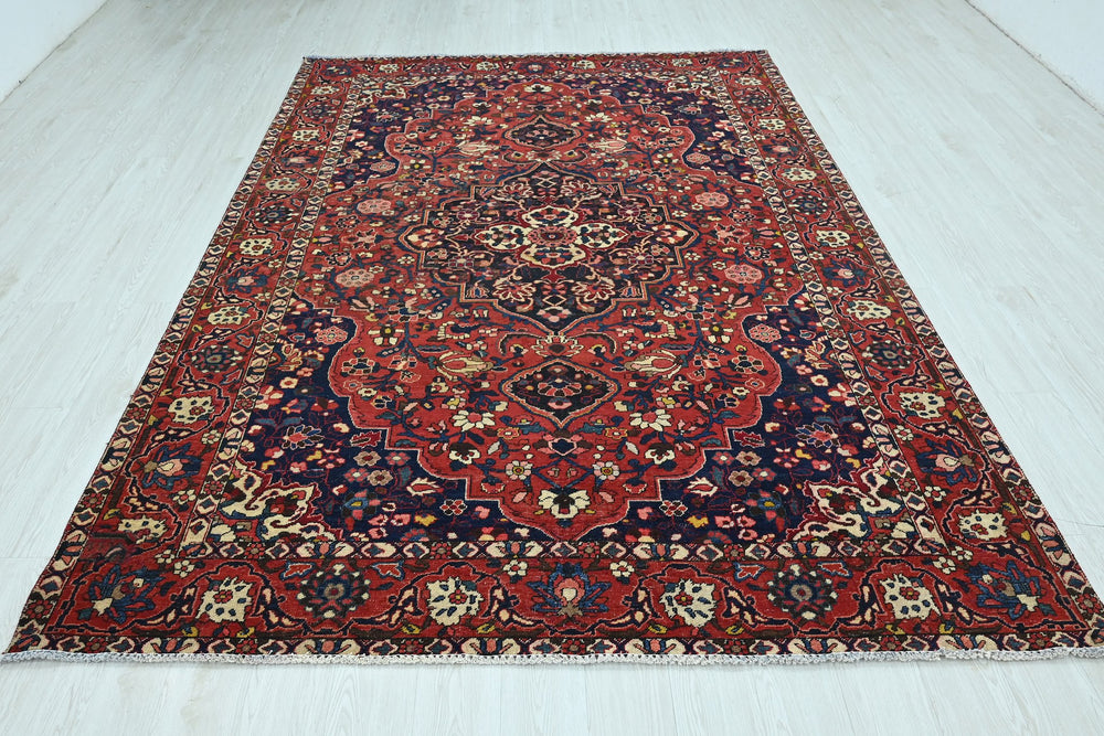 red Large rug 6' 9" x 9' 10"