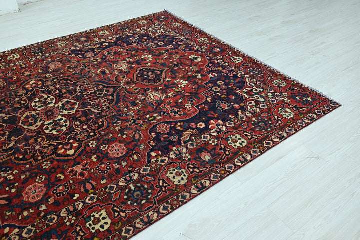 red Large rug 6' 9" x 9' 10"