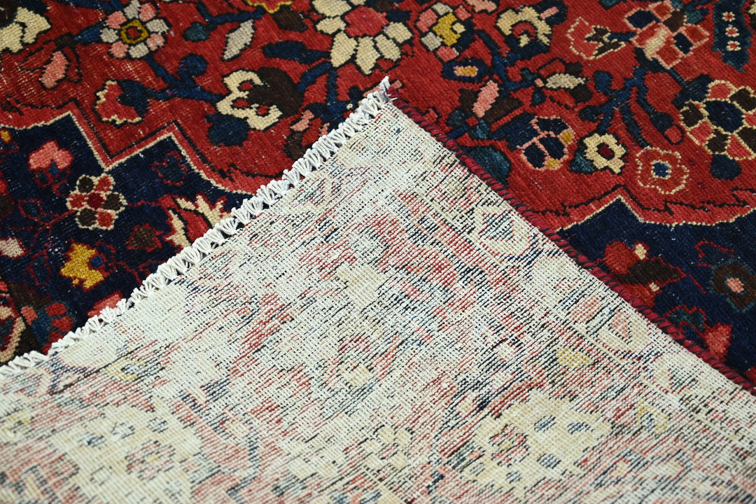 red Large rug 6' 9" x 9' 10"