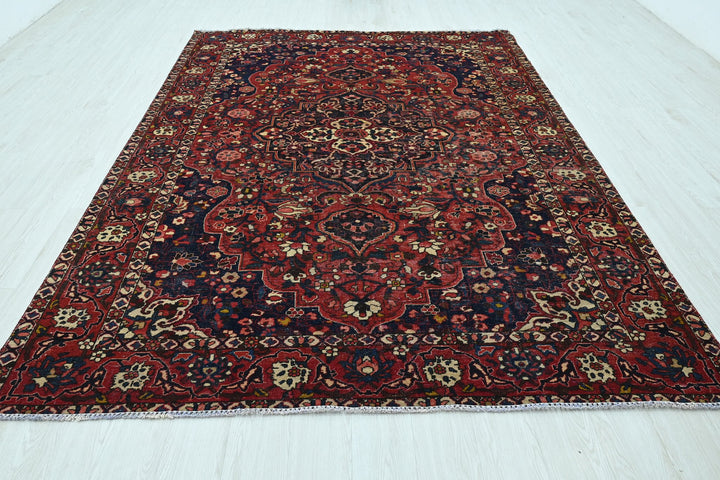 red Large rug 6' 9" x 9' 10"