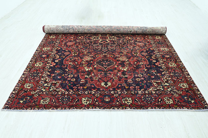 red Large rug 6' 9" x 9' 10"