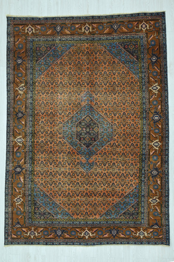 orange Medium rug 6' 3" x 9' 1"