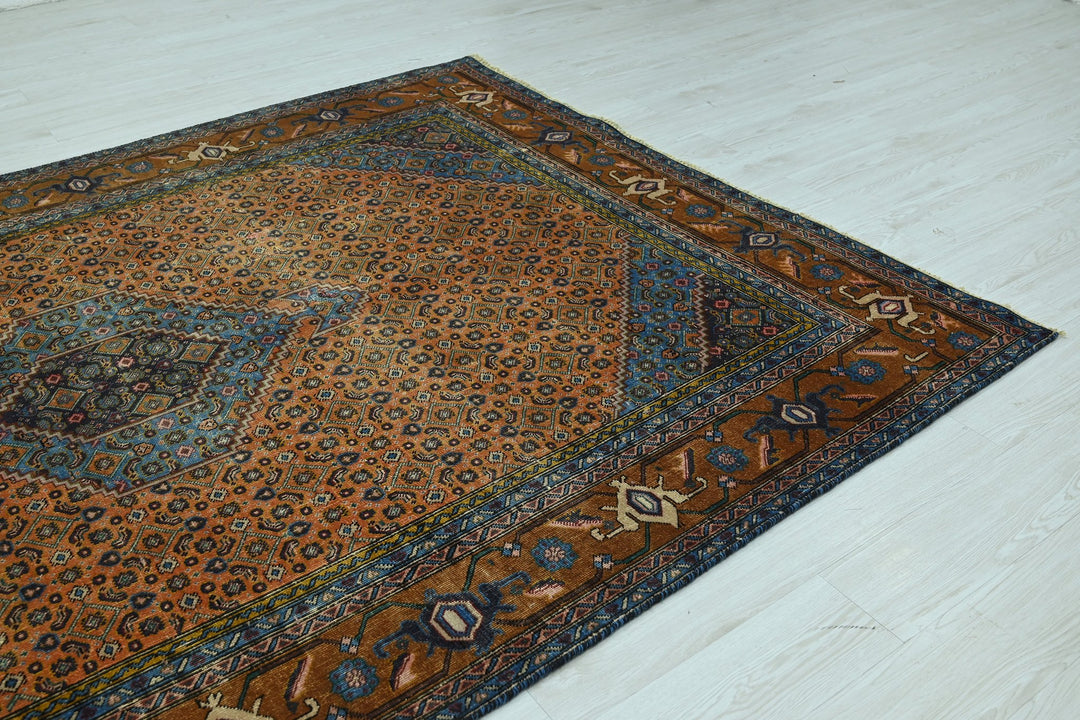 orange Medium rug 6' 3" x 9' 1"