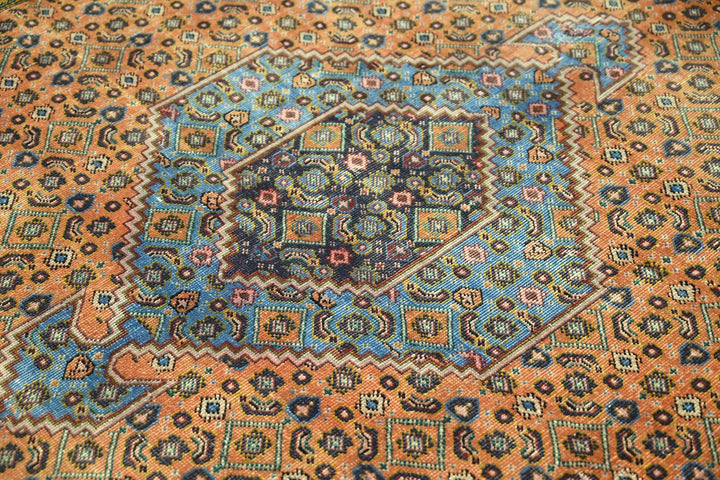orange Medium rug 6' 3" x 9' 1"